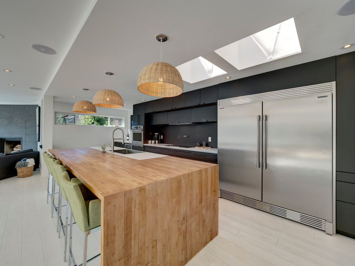 Kitchen looking out to inlet with butcher block island